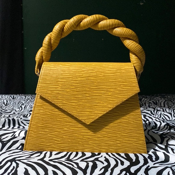 anima iris Handbags - Brand new genuine leather yellow handbag